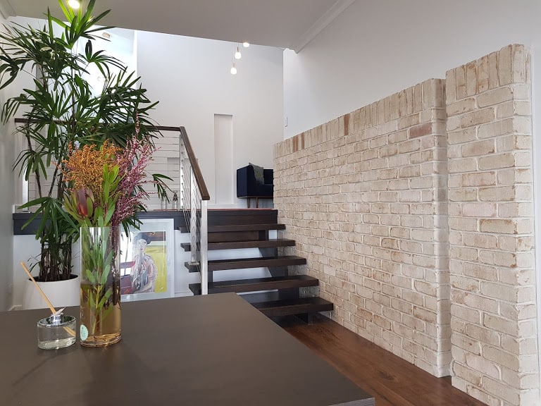 Woodforde residence — stair and brick feature wall